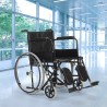 Sedia a rotelle pieghevole anziani con poggiagambe acciaio 15 kg Peony Stock