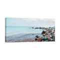 Stampa su tela paesaggio marino Ciottoli sulla spiaggia Pangea Images Promozione