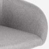 Sedia poltroncina moderna in tessuto imbottita con braccioli Rikku Stock