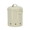 Barattolo vintage porta cipolle in latta forata con coperchio Stock